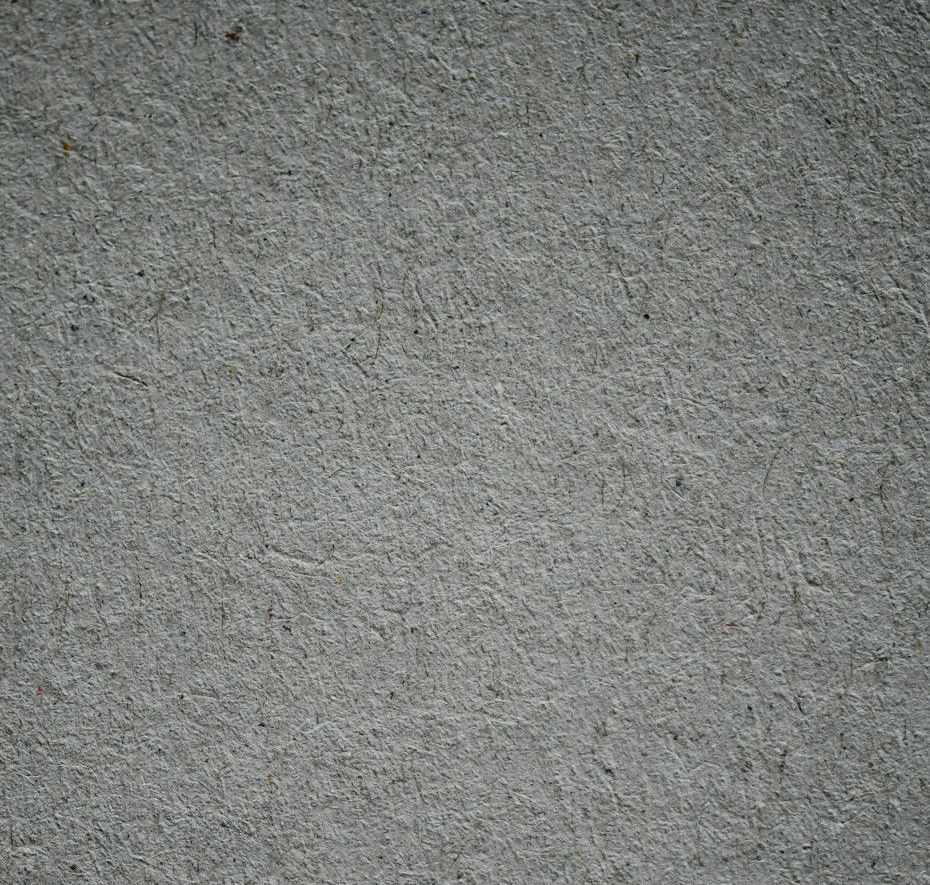 Gray, textured concrete surface.