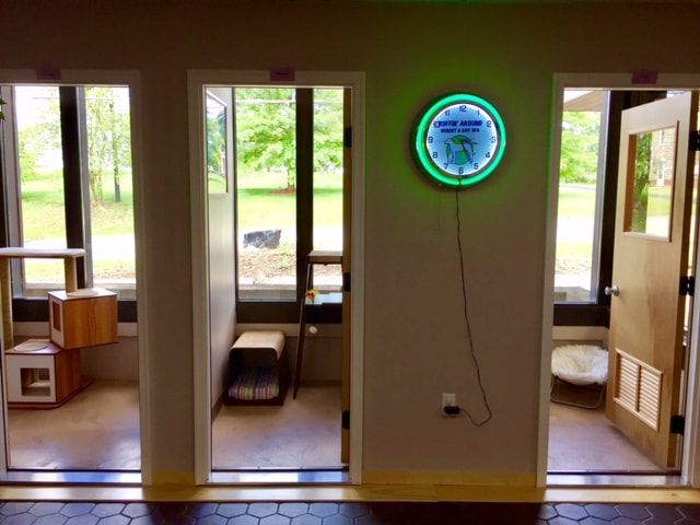 A room with a clock on the wall that says ' ambulance ' on it