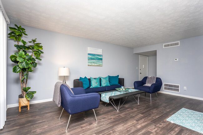 The Woods At Peppertree living room with couch