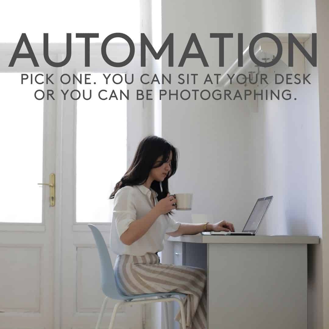 A woman sits at a desk with a laptop and a cup of coffee