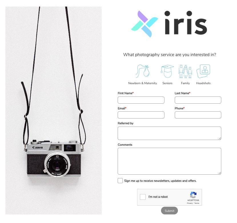 A camera is hanging from a strap next to a form that says iris