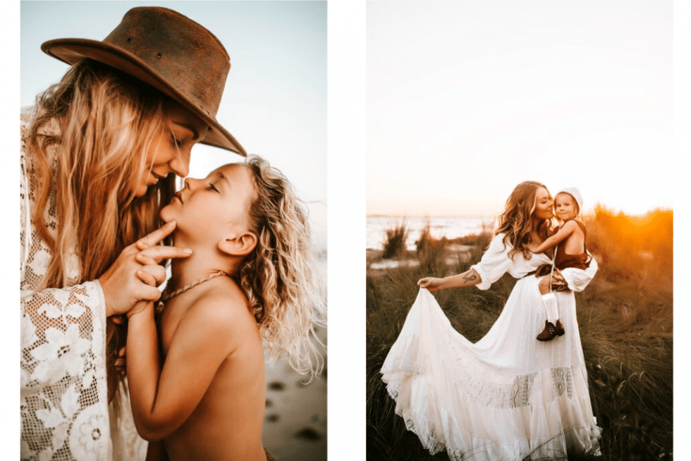 A woman in a hat is kissing a little girl on the cheek.