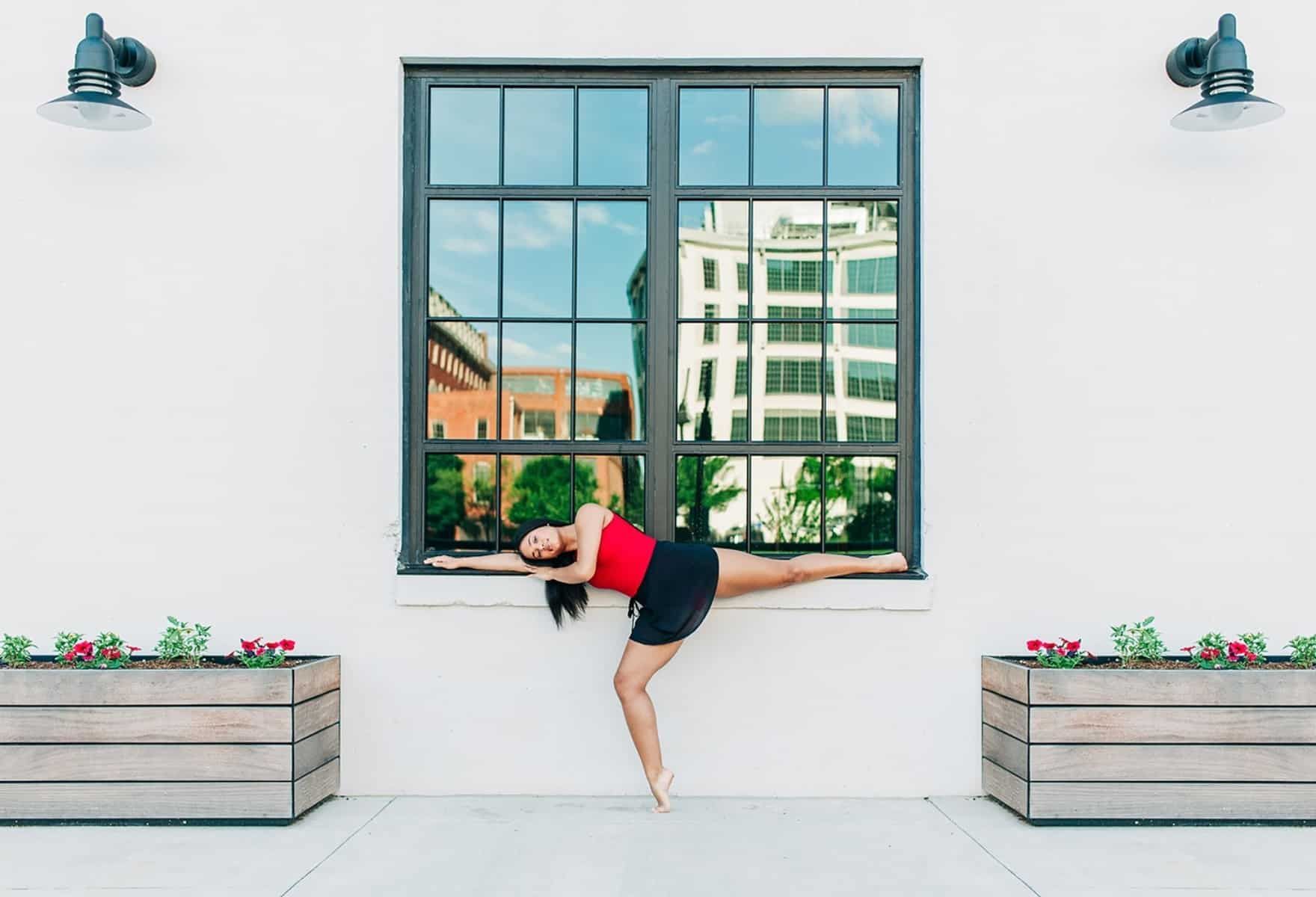 A delicate ballet performance in front of the window