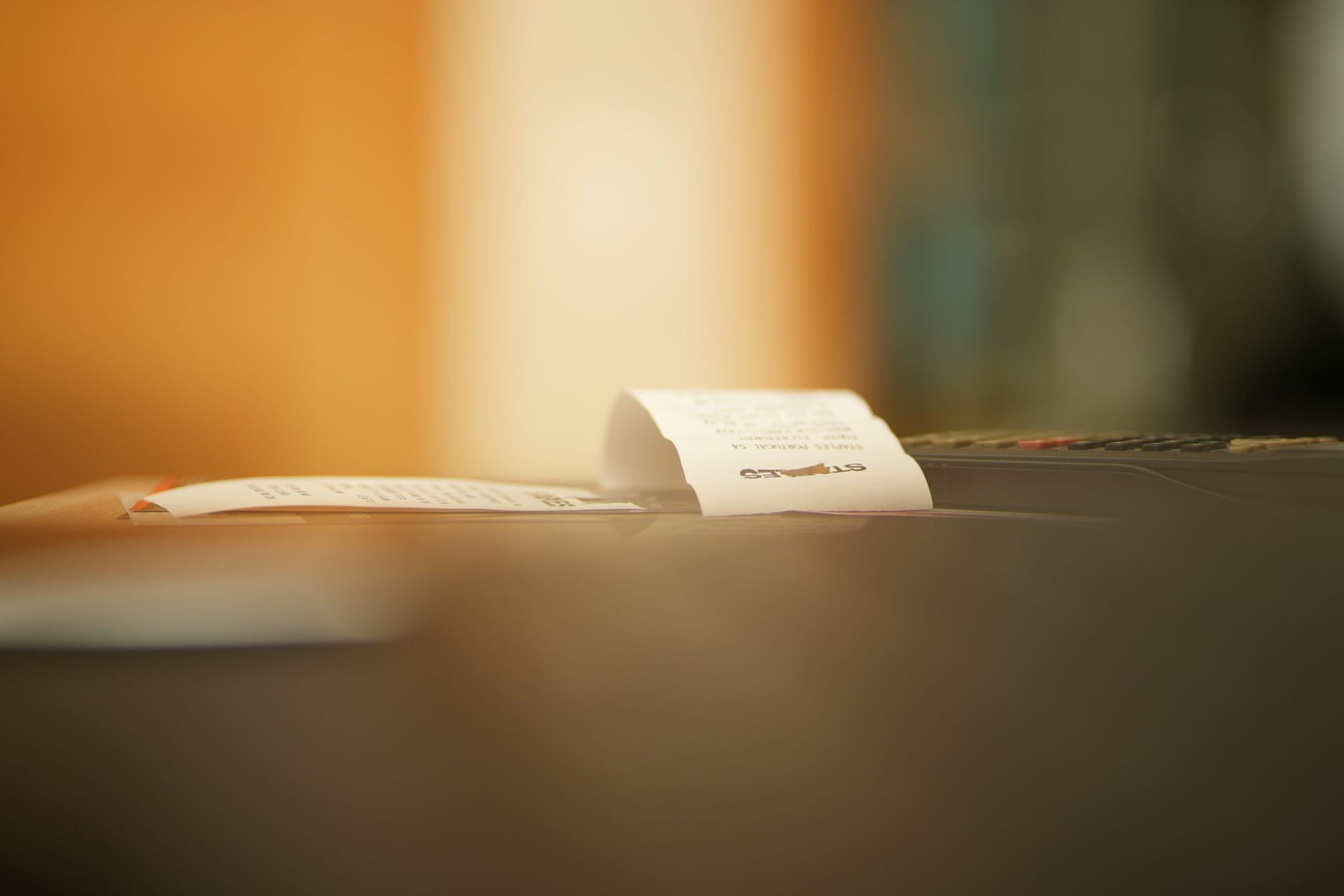 A receipt is sitting on top of a table.