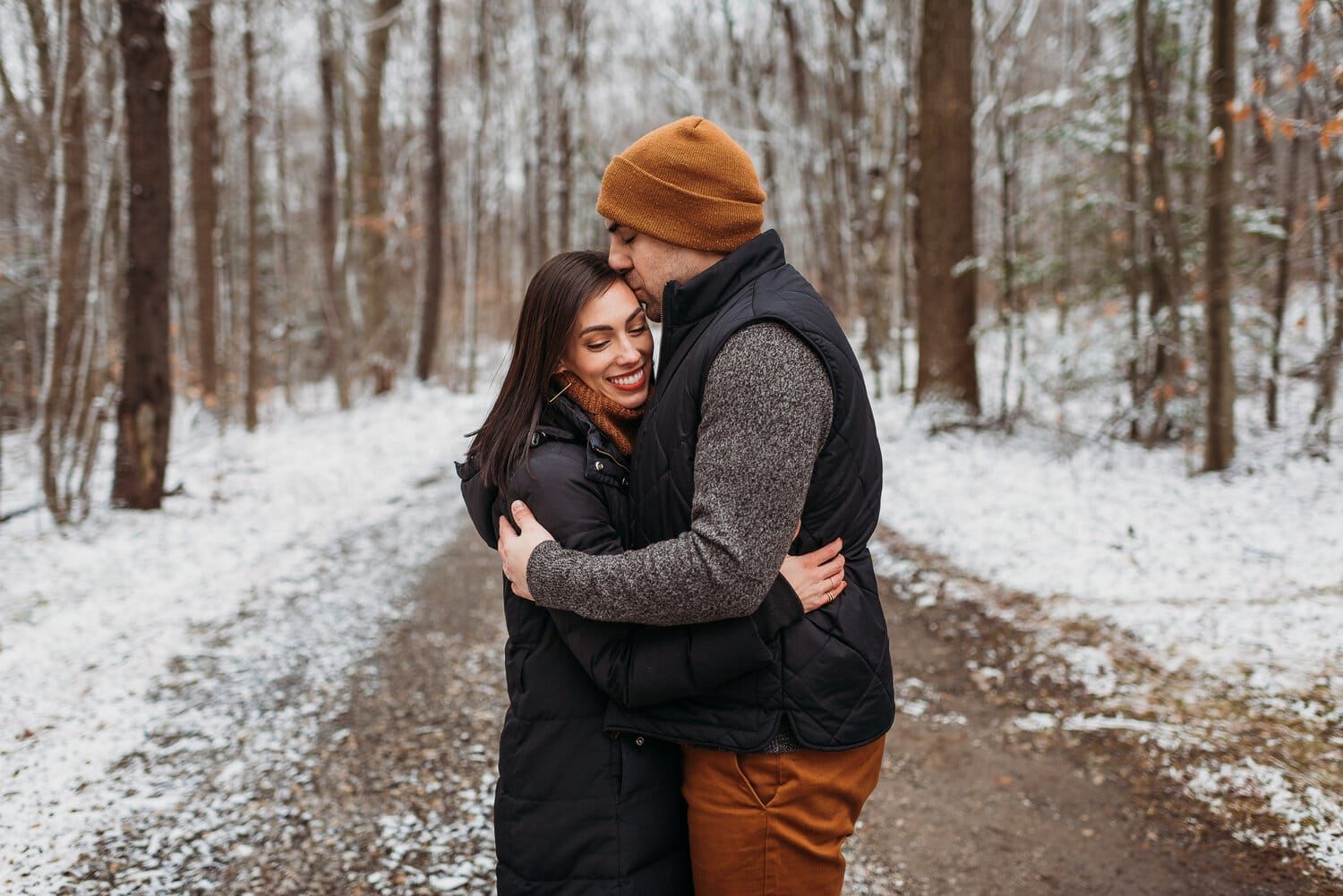 Serene Winter Moment Couple Embracing in the Forest