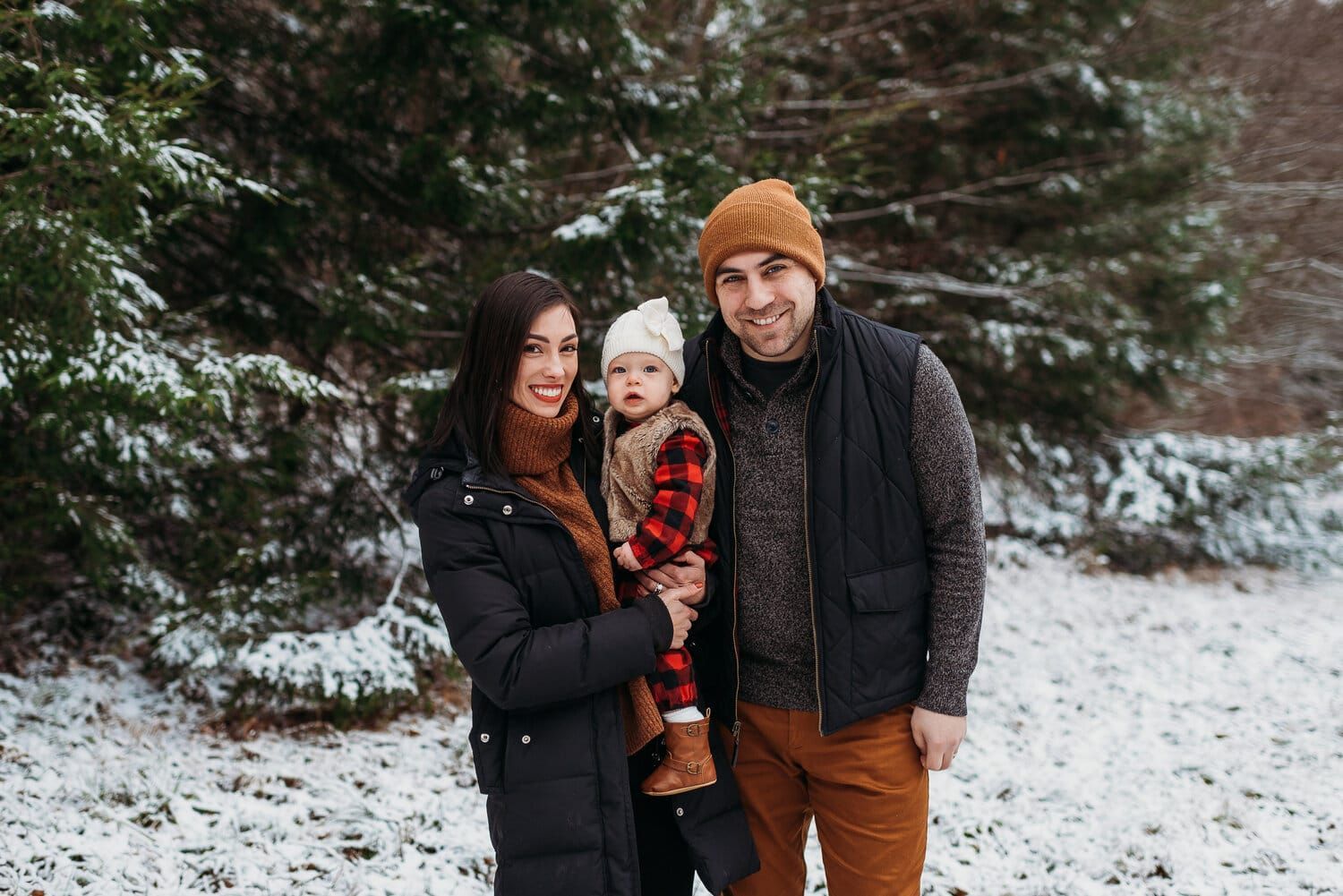 Happy Family Portrait in a Winter Wonderland