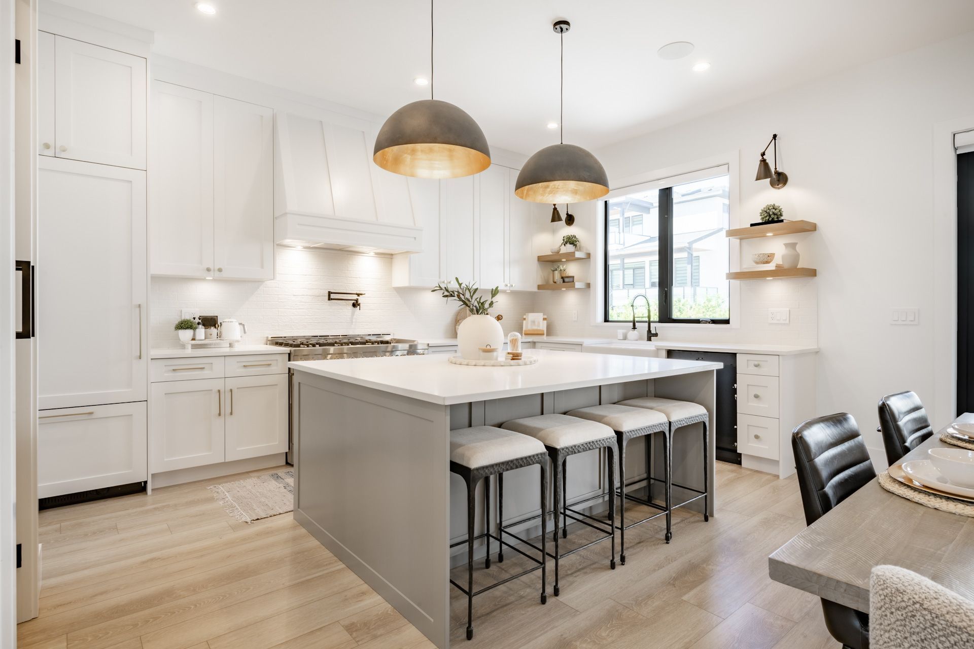 There is a large island in the middle of the kitchen.