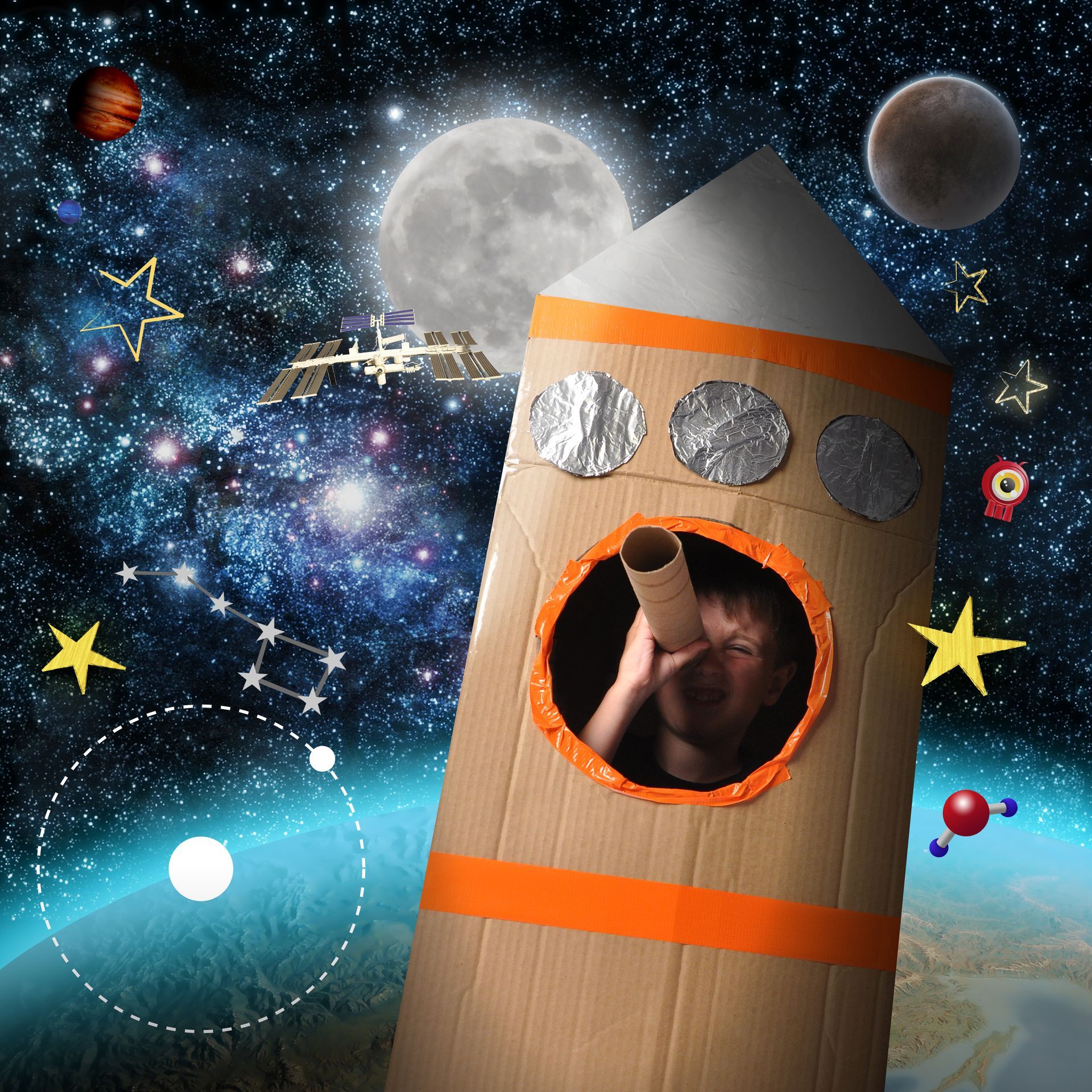 Child in a cardboard rocket pretending to be launched into outer space