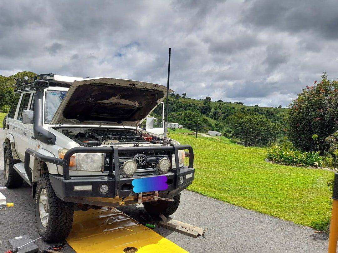 A Truck With Its Hood Up Is Parked On The Side Of The Road — Weyba Automotive Services In Kuluin, QLD