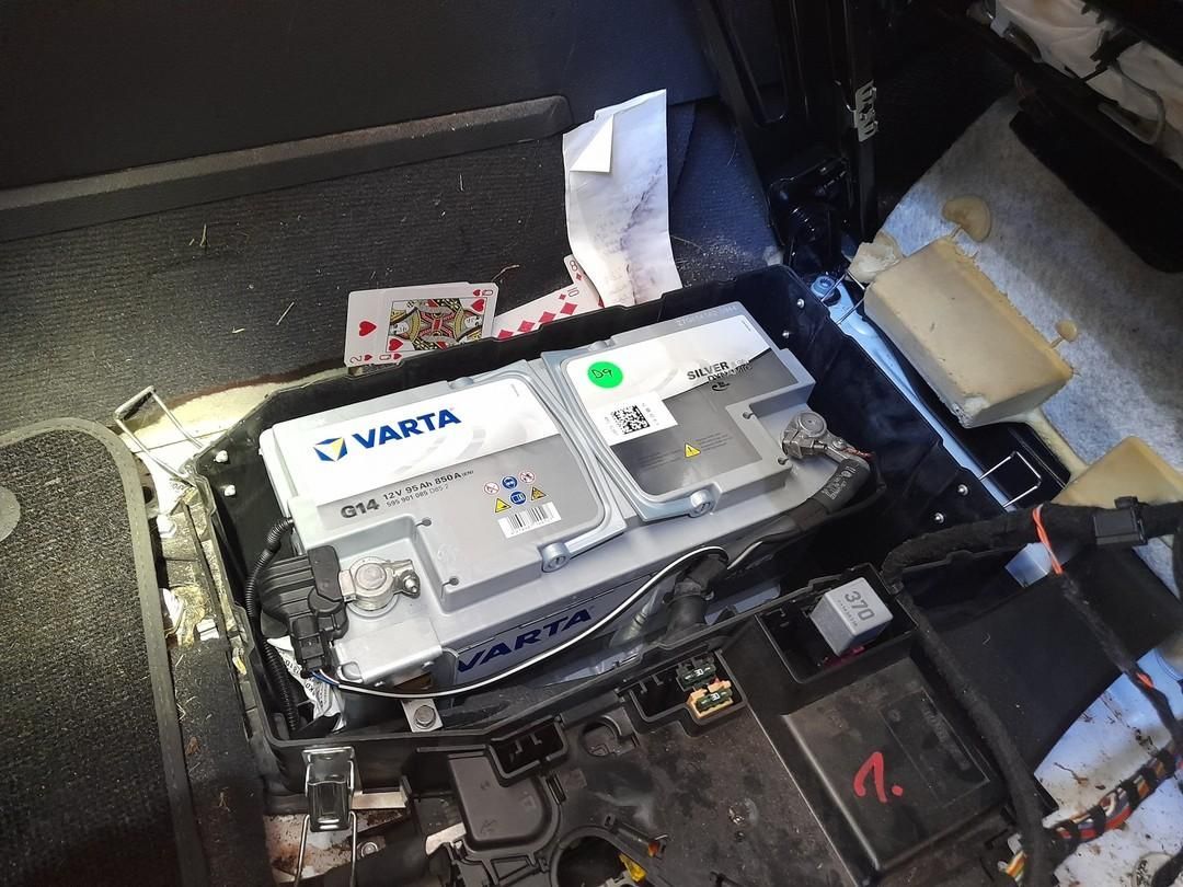 A Varta Battery Is Sitting In The Trunk Of A Car — Weyba Automotive Services In Kuluin, QLD