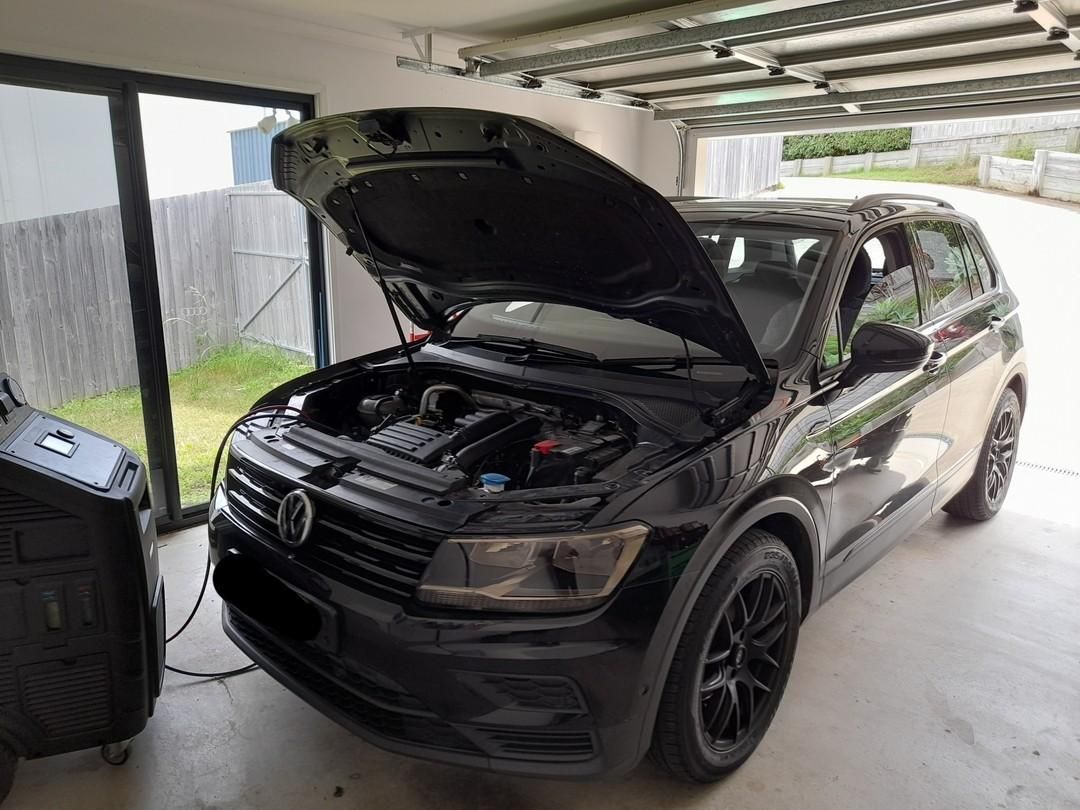 A Black Volkswagen Tiguan Is Parked In A Garage With Its Hood Open — Weyba Automotive Services In Kuluin, QLD