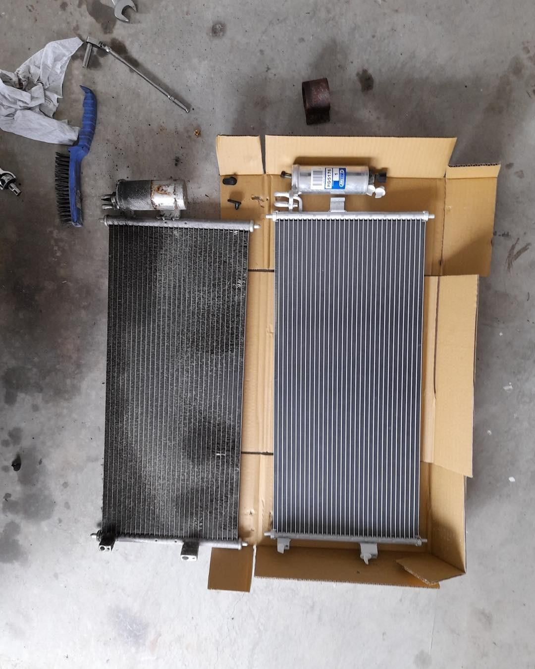 Two Radiators Are Sitting On Top Of A Cardboard Box — Weyba Automotive Services In Kuluin, QLD
