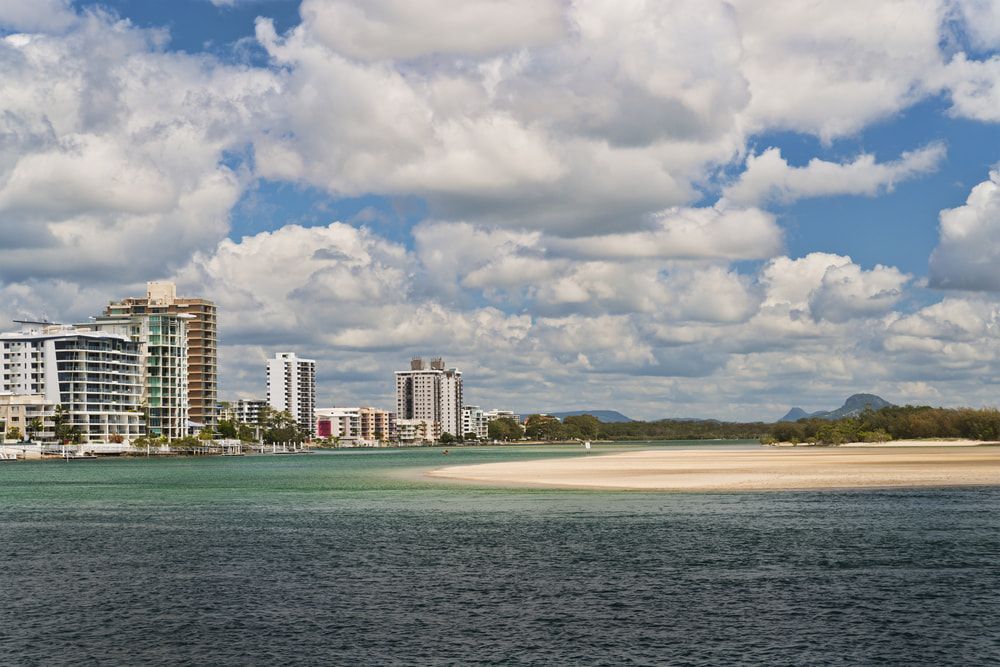 A Large Body Of Water With A City In The Background — Weyba Automotive Services In Maroochydore, QLD
