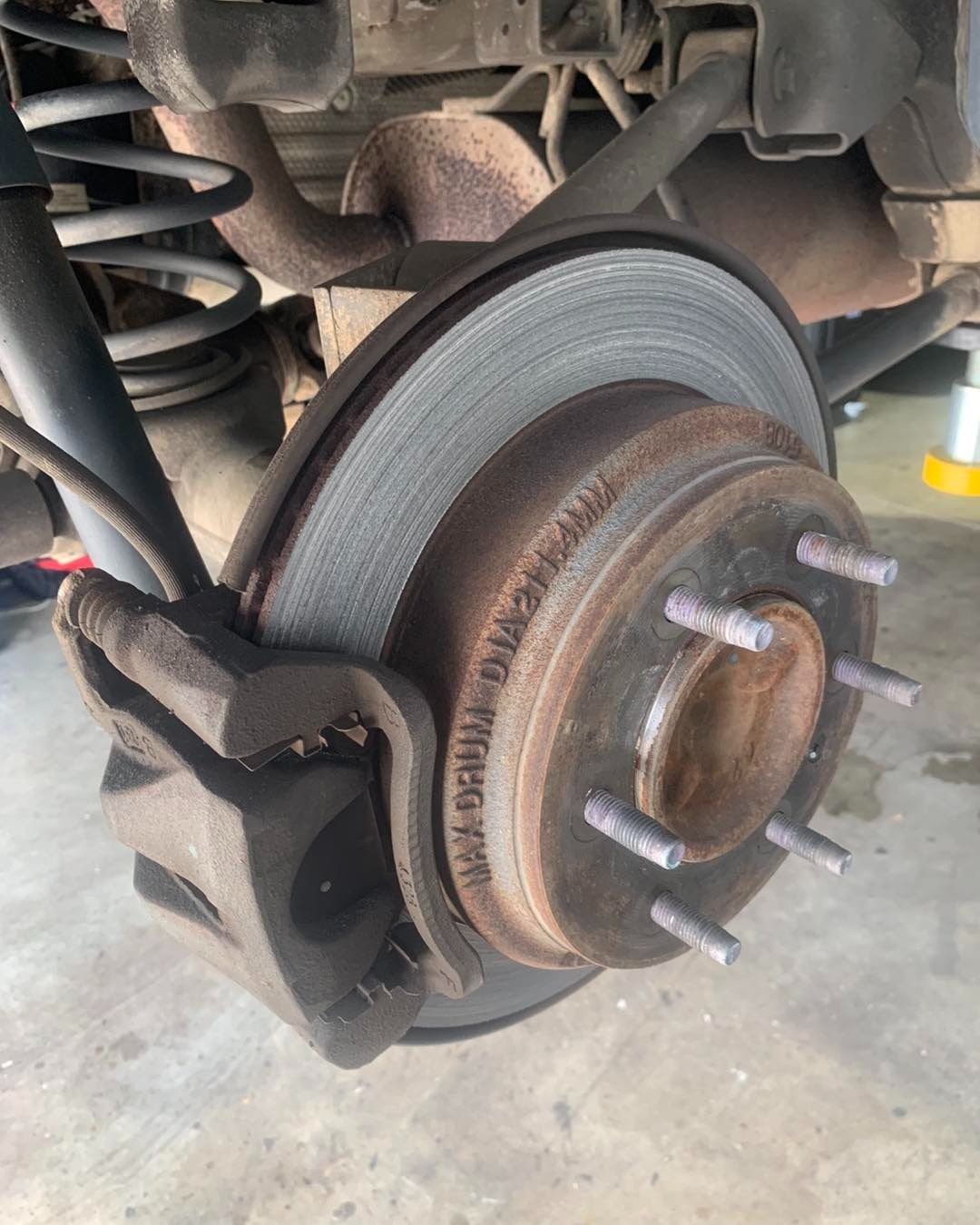 A Close Up Of A Rusty Brake Disc On A Car — Weyba Automotive Services In Kuluin, QLD