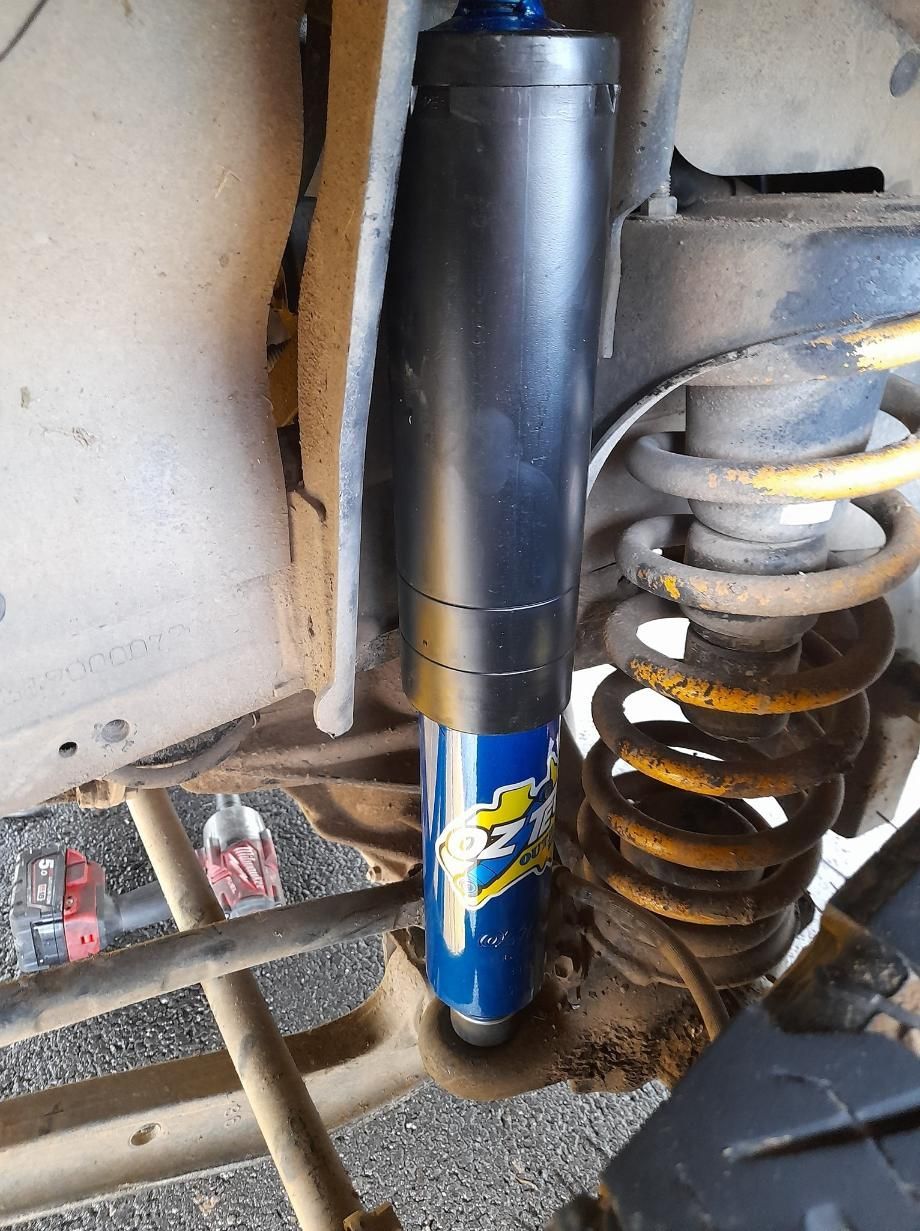 A Close Up Of A Shock Absorber On A Vehicle — Weyba Automotive Services In Kuluin, QLD