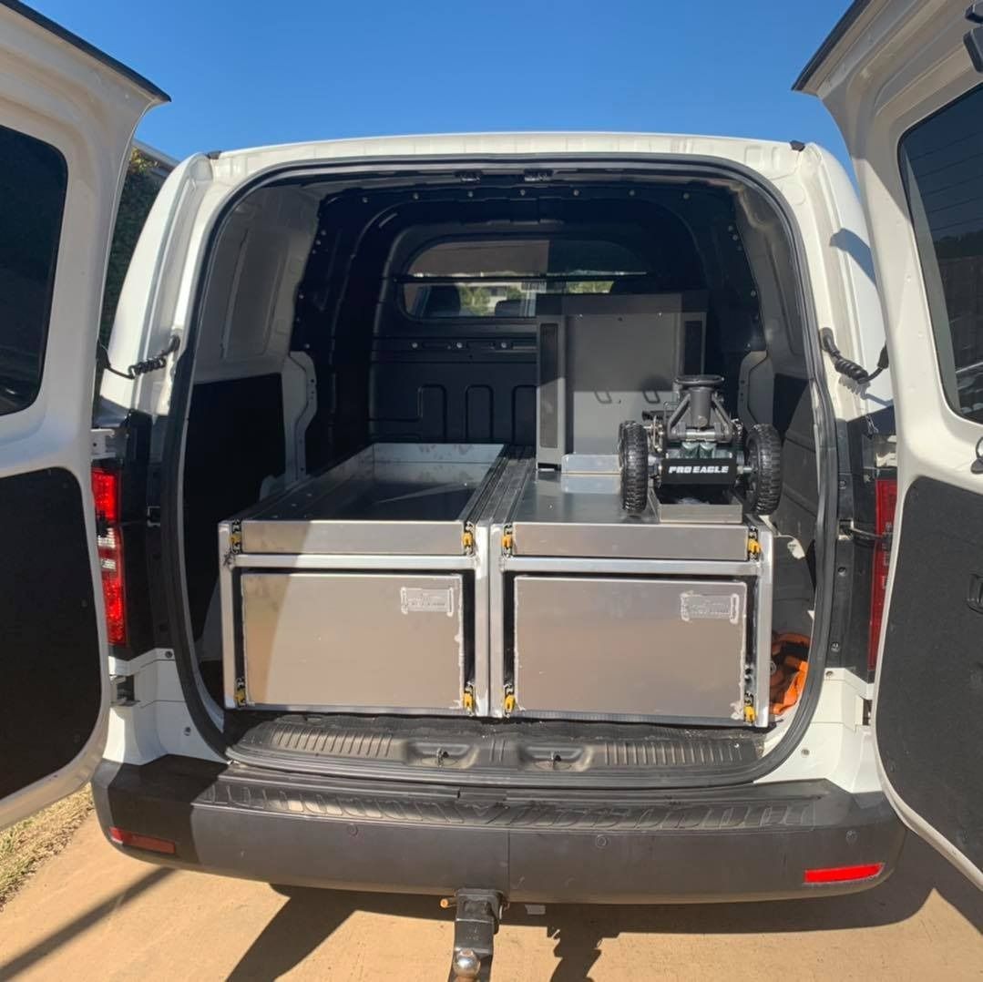 The Back Of A White Van With The Doors Open — Weyba Automotive Services In Kuluin, QLD