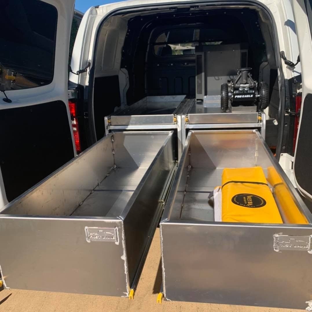The Back Of A Van With Drawers And A Yellow Box In It — Weyba Automotive Services In Kuluin, QLD