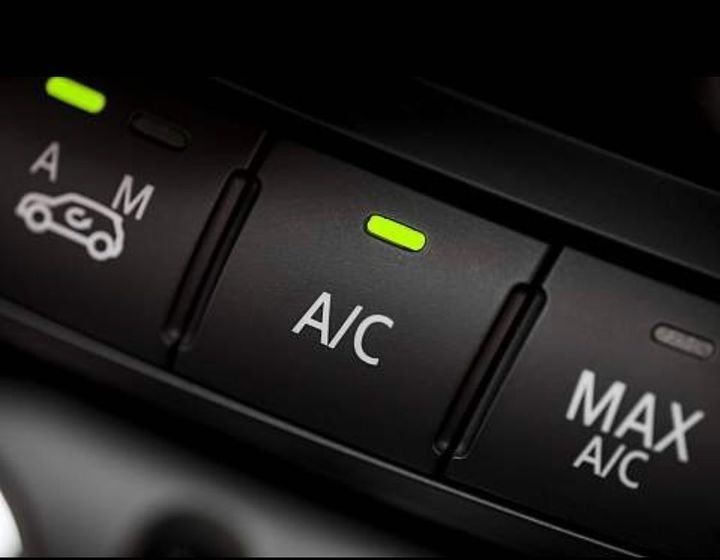 A Close Up Of A Car 's A/c And Max A/c Buttons — Weyba Automotive Services In Kuluin, QLD