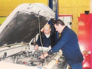 Mechanics Working On Car — Randolph, MA — Auto Craft, Inc.