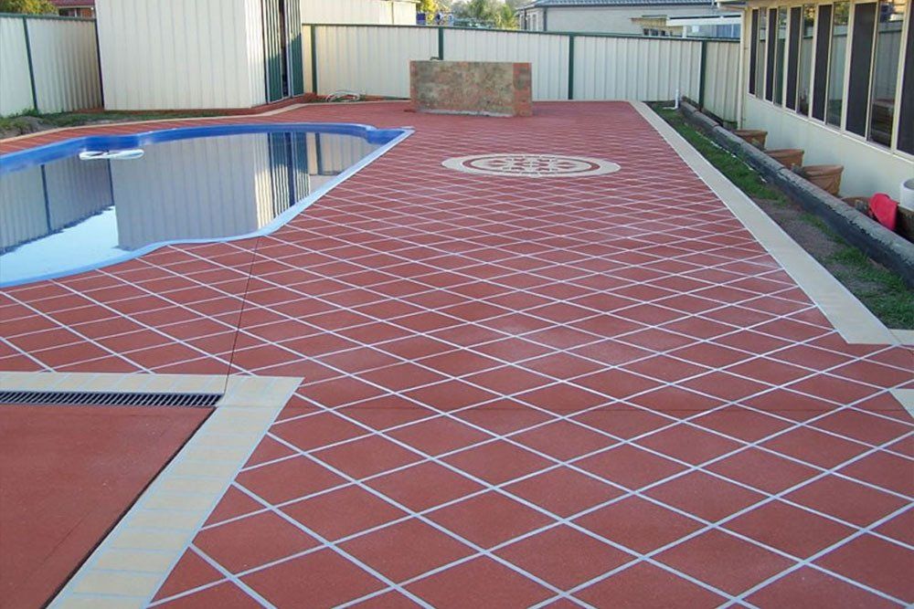 Large Tile in Dark Terracotta — Concrete Stamping in Morisset, NSW