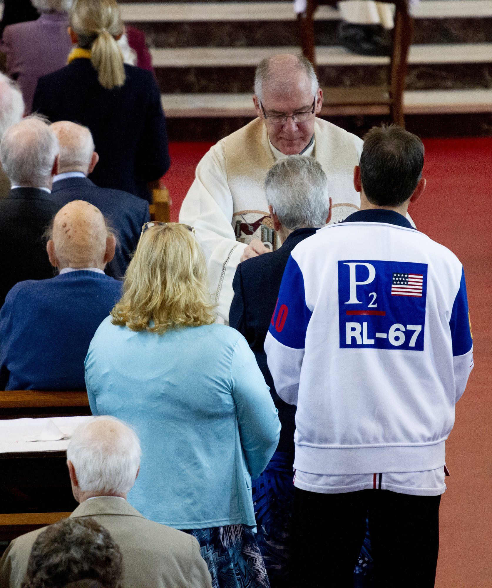 A man wearing a jacket that says p2 rl-67