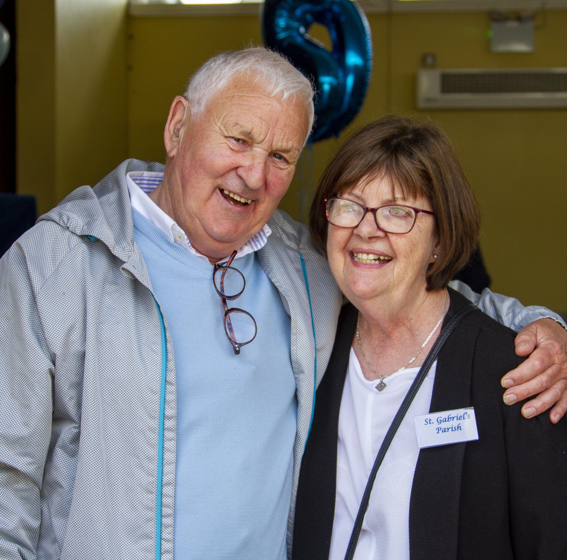 A man and a woman are posing for a picture together