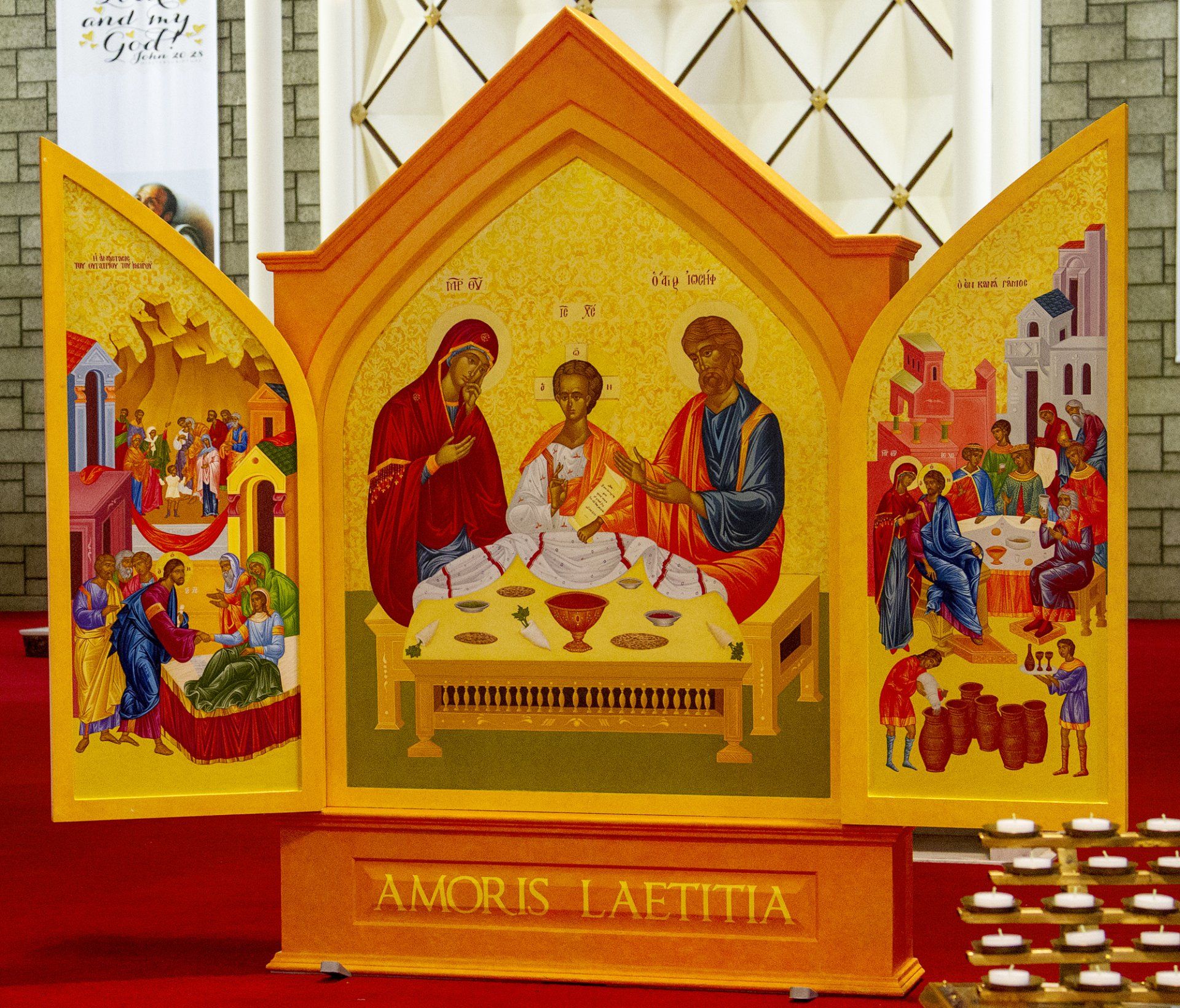 The word amoris that is on a piece of art