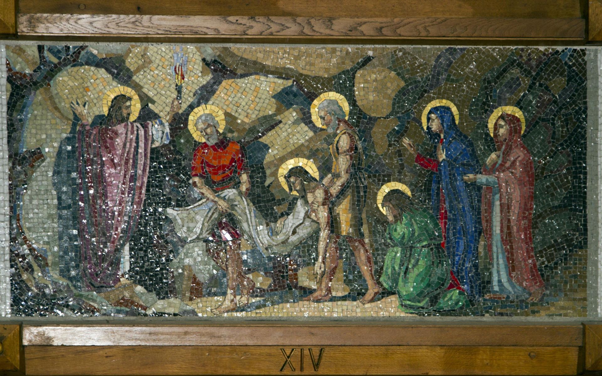 A mosaic painting of jesus being laid in the tomb