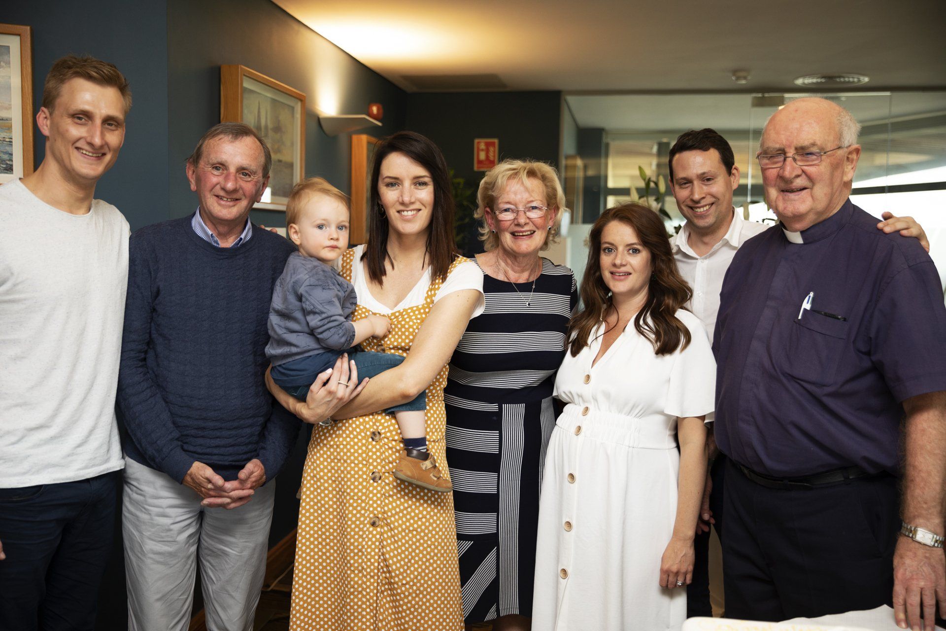 A group of people are posing for a picture together.
