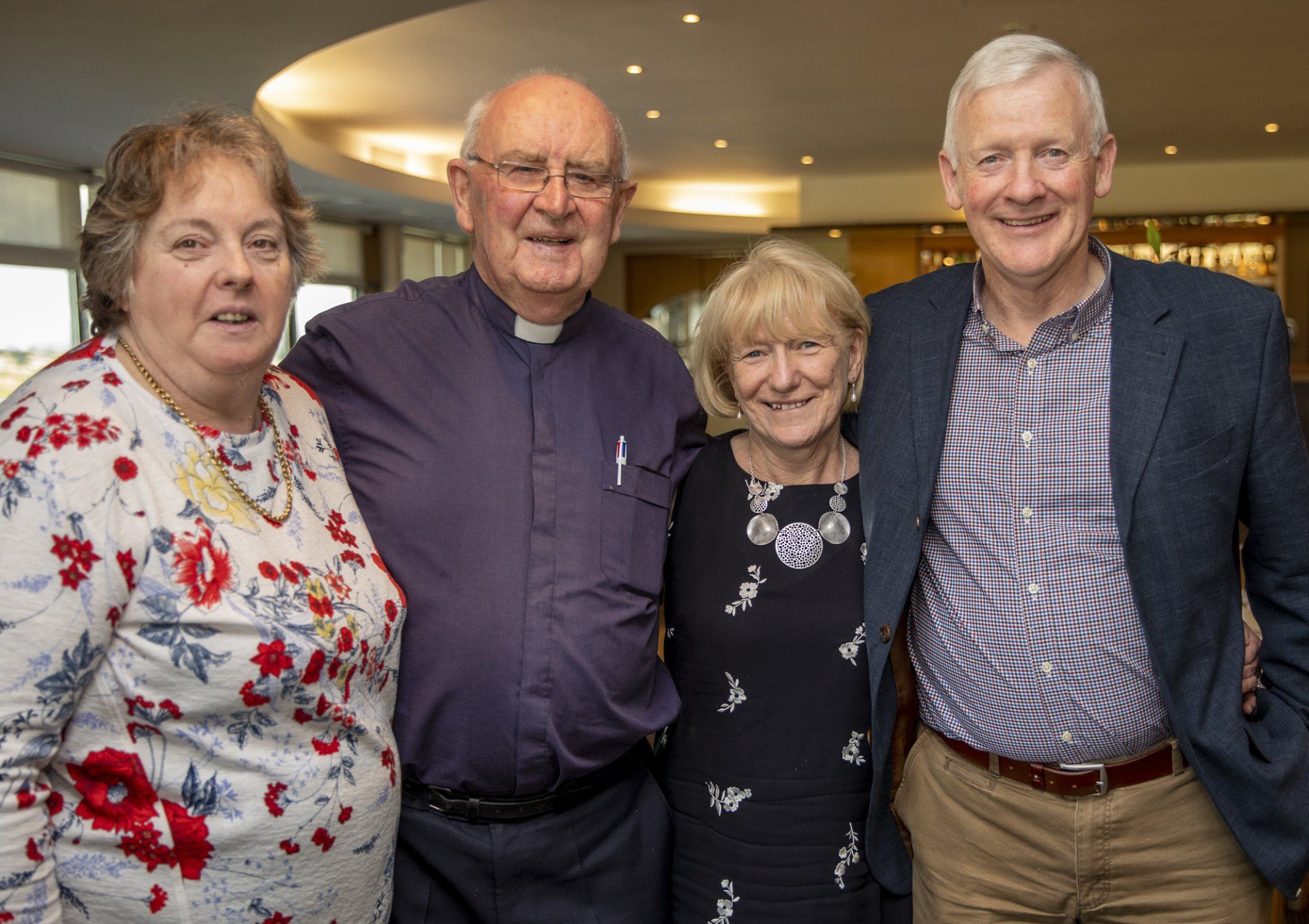 A group of people are posing for a picture together.