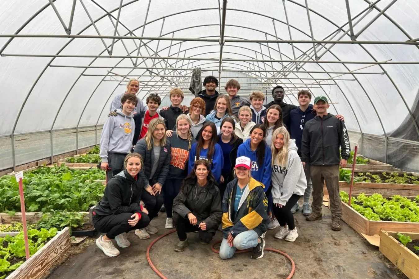 Volunteers in the high tunnel!