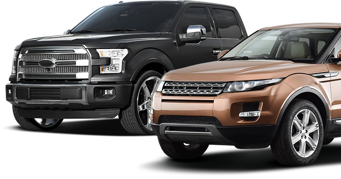 A black pickup truck parked next to a metallic brown SUV against a white background. | Russell's Garage