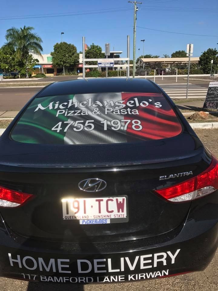 A Black Car With a Home Delivery Sign on the Back Window — Michelangelos Pizza & Pasta in  Annandale, NSW