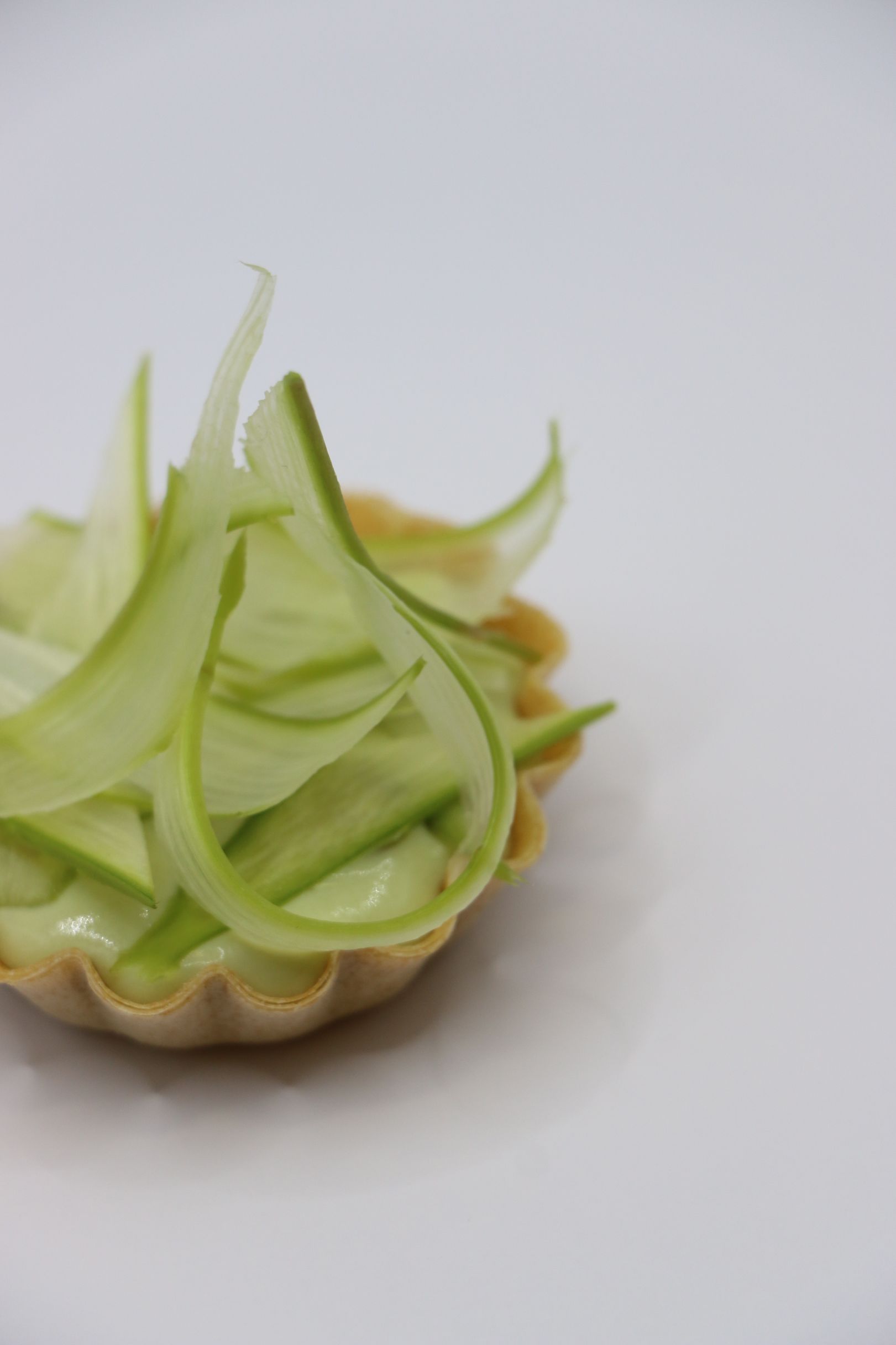 A long table with plates and silverware on it