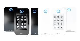 Two sets of external hard drives, black and white, with keypad and logo on the top left.