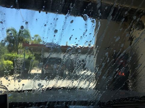 A Car Is Being Washed In A Car Wash — Emerald Car Wash In Emerald, QLD