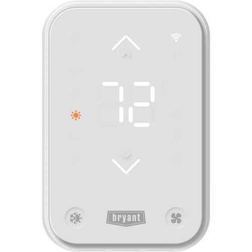 A white thermostat with a screen that shows the temperature is 72 degrees fahrenheit.