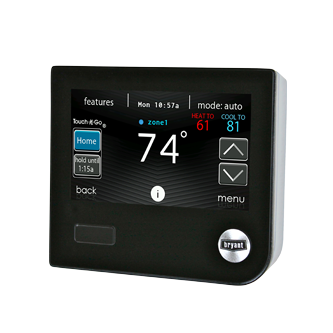 A black thermostat displays the temperature at 74 degrees
