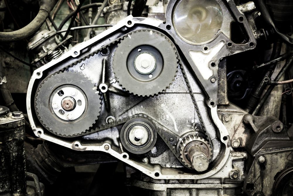 Engine Components With a Timing Belt, Gears, and Pulleys Visible — Bob Kolln Automotive In Warnervale, NSW