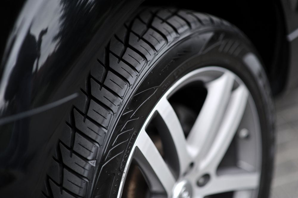 Close-up of a Black Car Tire With a Silver Alloy Wheel — Bob Kolln Automotive In Charmhaven, NSW