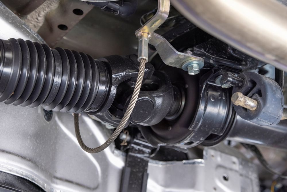 Undercarriage of a Vehicle, Showing a Black Driveshaft — Bob Kolln Automotive In Wadalba, NSW