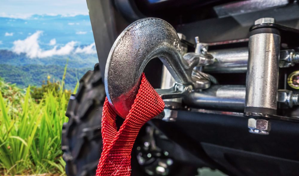 Close-up of a Winch Hook With a Red Strap Attached, Mounted on an Off-road Vehicle — Bob Kolln Automotive In Toukley, NSW