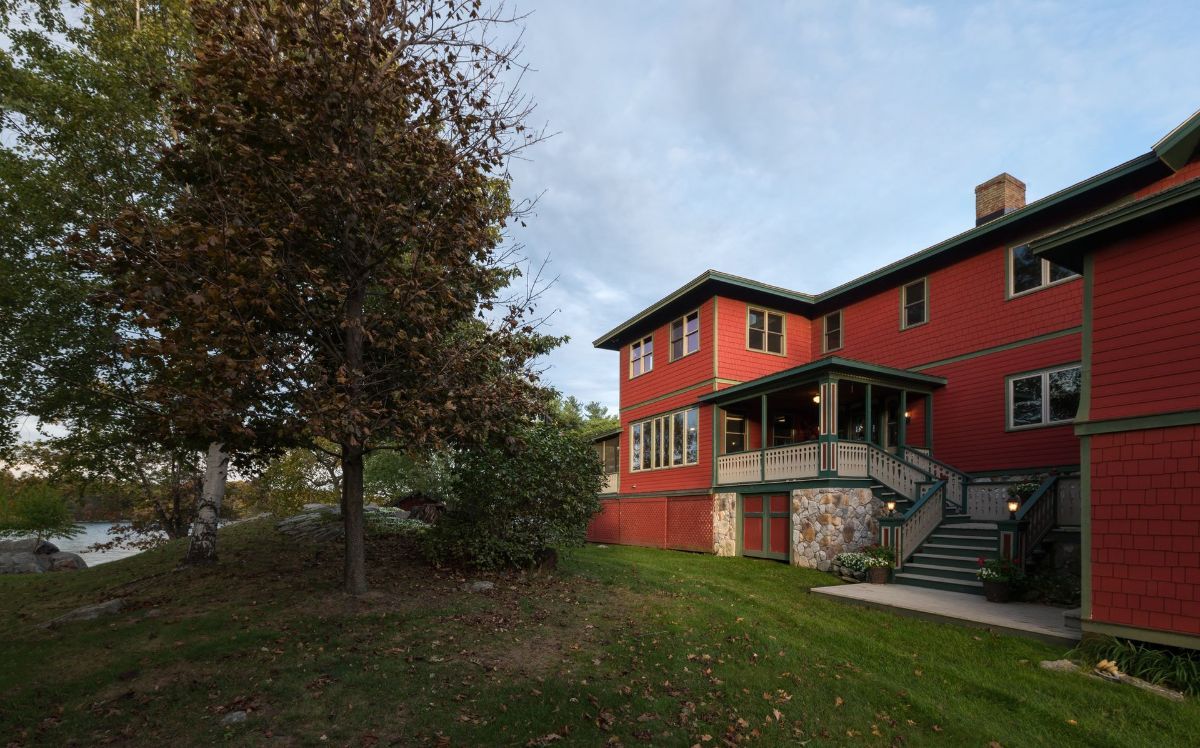 A large red building with stairs leading up to it