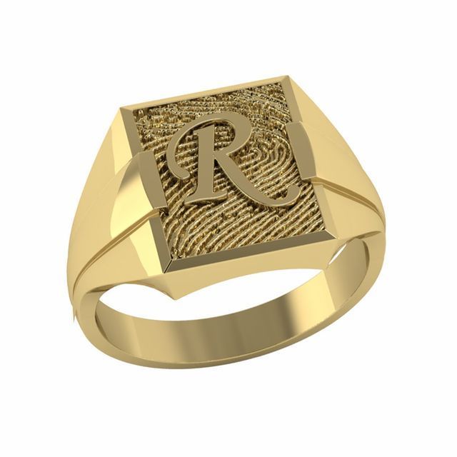 Gouden zegelring met vingerafdruktextuur en hoofdletter 