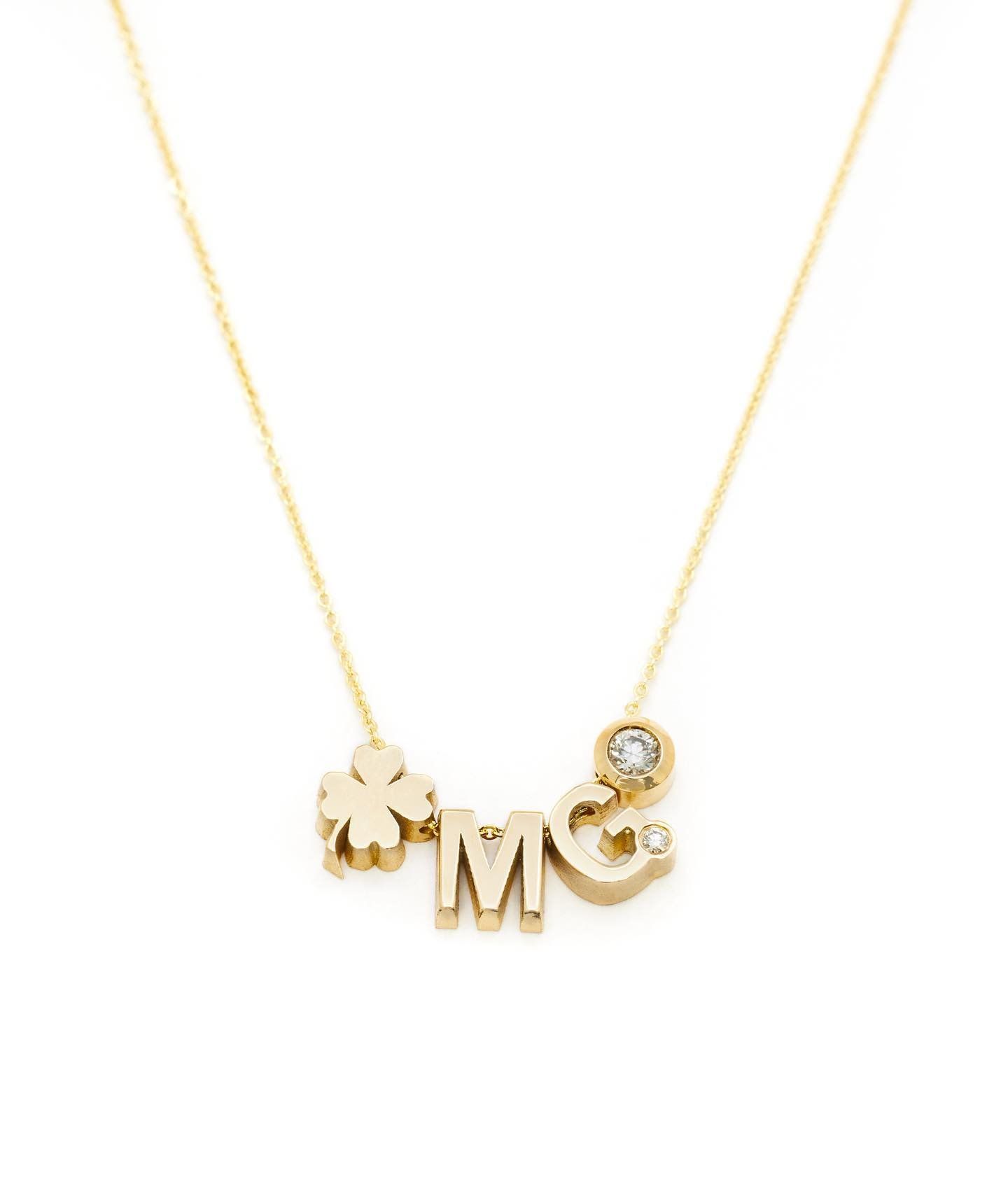 Gouden ketting met klavertjevier, letter 