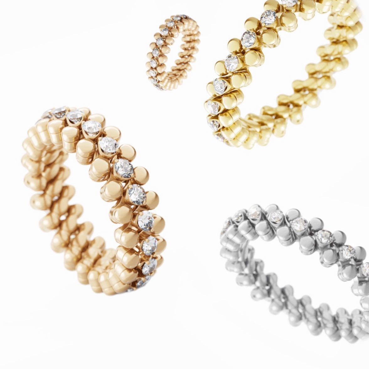 Vier gouden en zilveren ringen met kralenmotief; sommige met diamanten.