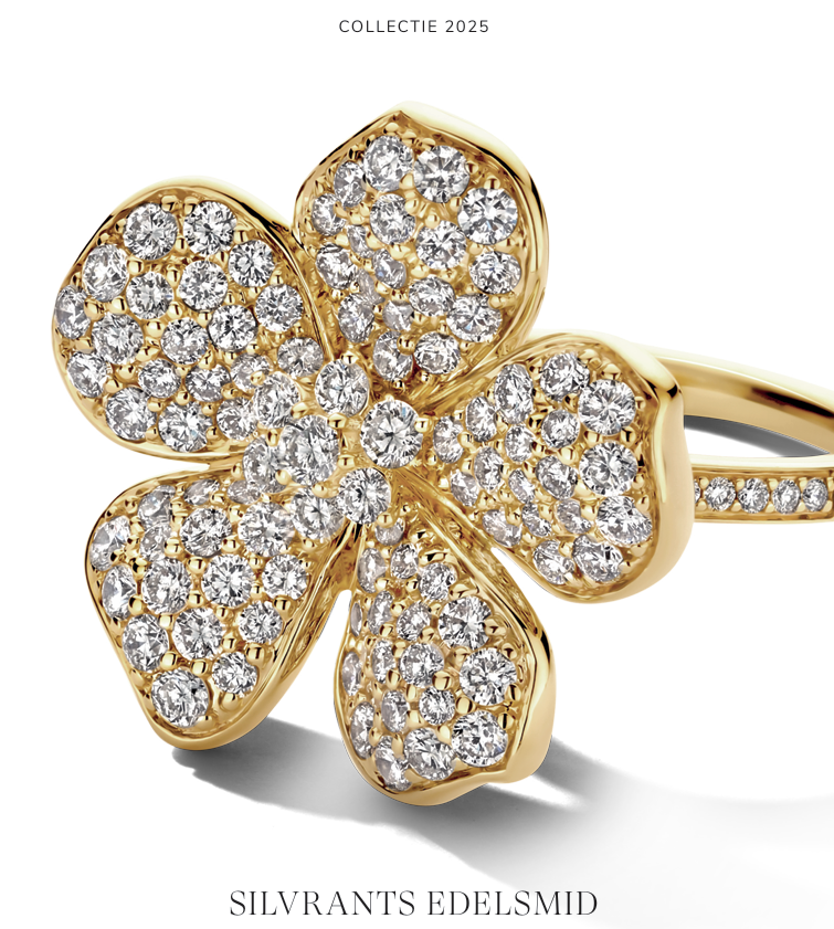 Gouden bloemenring met diamanten accenten.