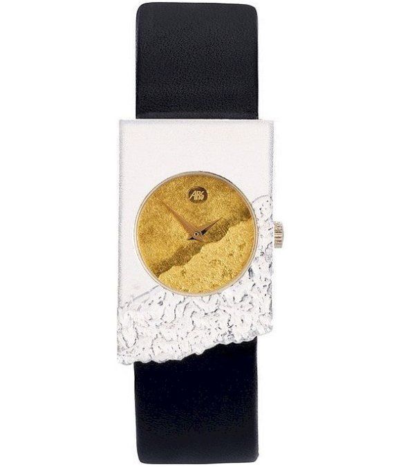 Zilverkleurig en goudkleurig polshorloge met zwarte leren band.