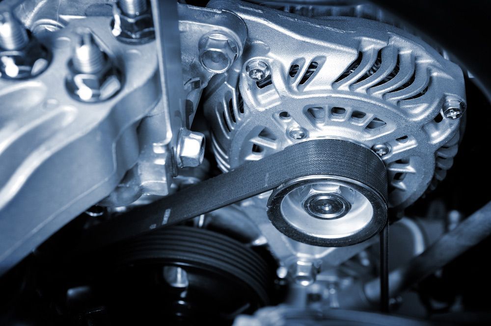 A Close Up Of a Car Engine with A Belt on It — Currajong Brake Parts Pty Ltd In Currajong, QLD