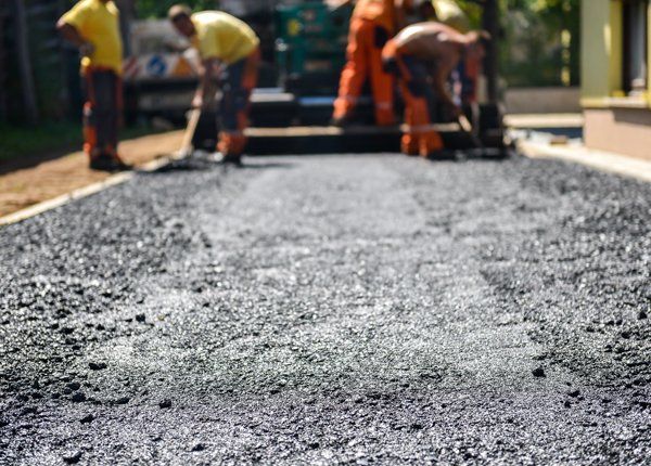 Professional workers doing asphalt paving — Edinburg, TX — Lone Star Asphalt Services LLC